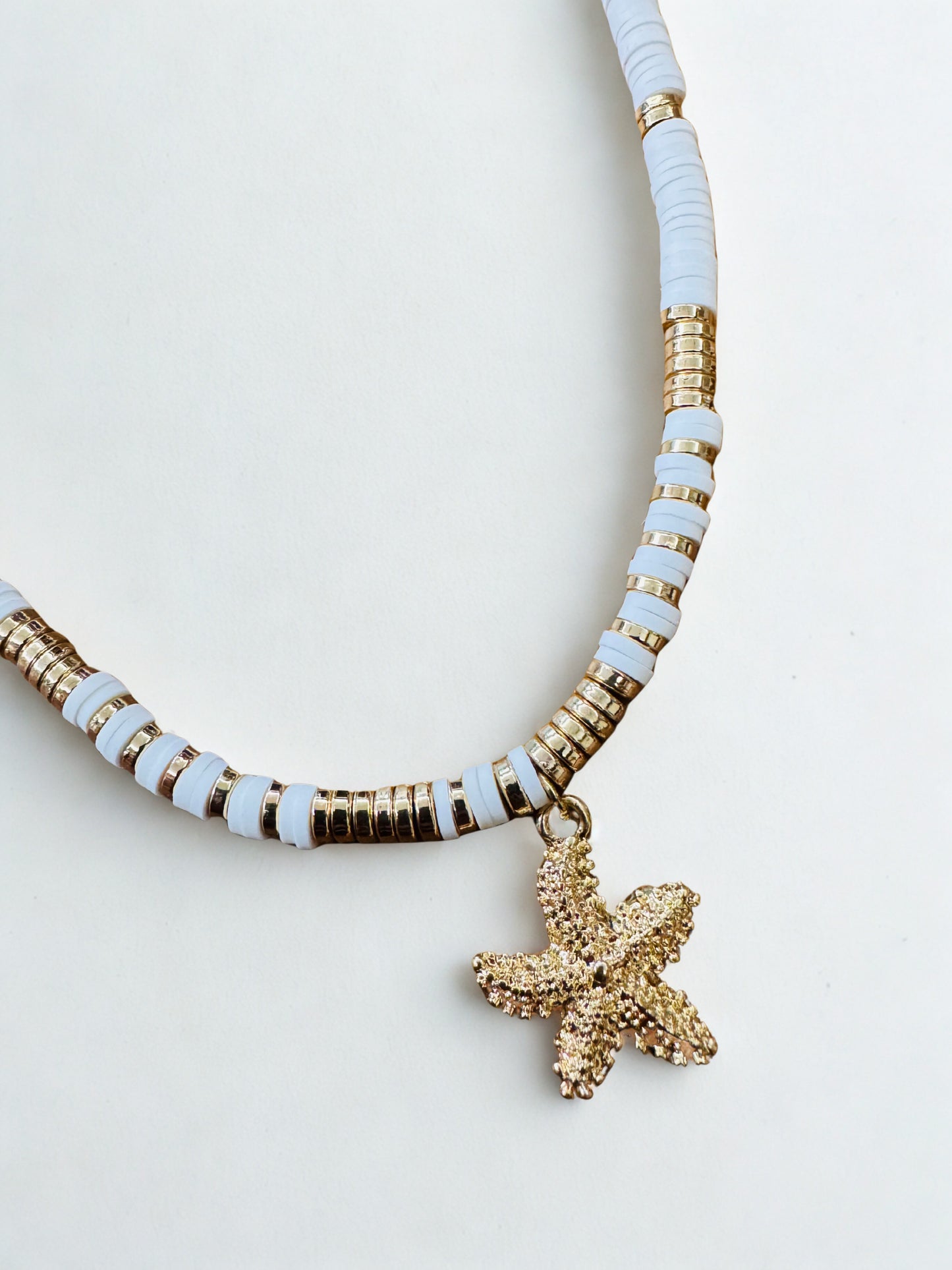 Coastal Charm Starfish Necklace Elegant, dainty and minimal jewelry perfect for everyday wear. Handcrafted gold and silver jewelry from Erica Jewelry India collection.