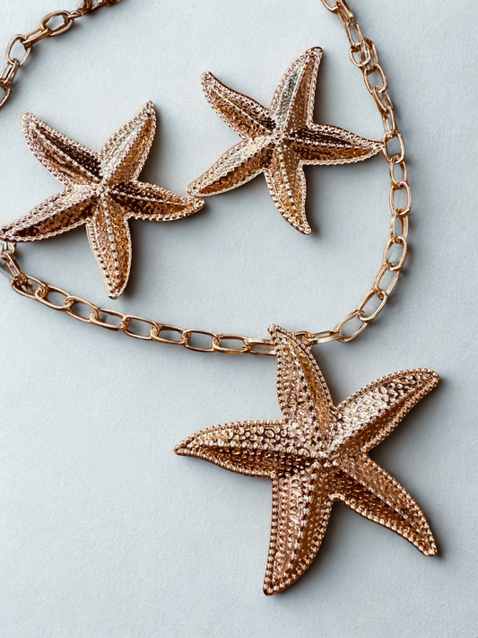 Golden Starfish Statement Set Elegant, dainty and minimal jewelry perfect for everyday wear. Handcrafted gold and silver jewelry from Erica Jewelry India collection.