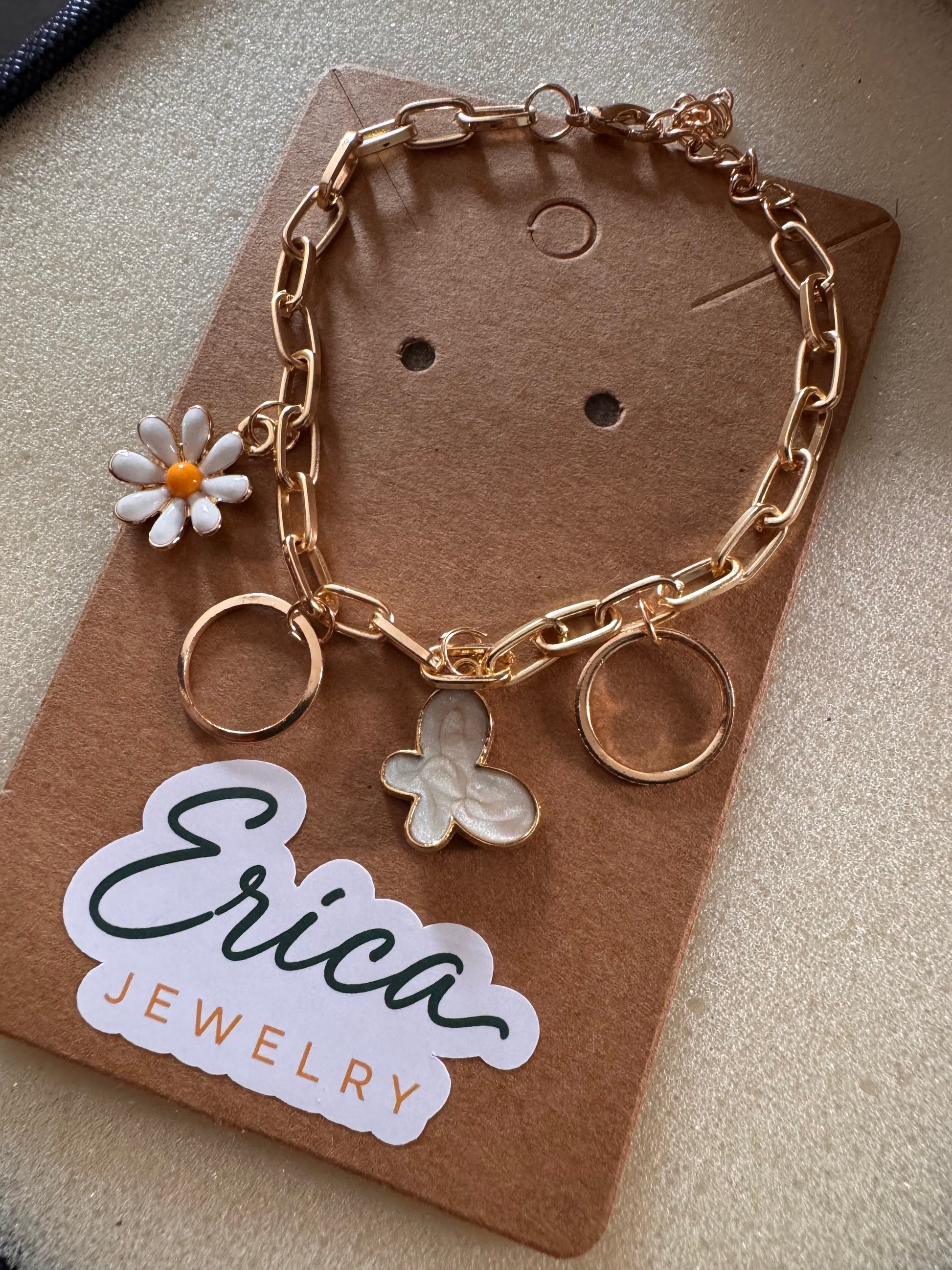 Butterfly Bloom Charm Bracelet Discover minimal, everyday gold jewelry designed for modern women. Shop earrings, rings, and necklaces at Erica Jewelry.