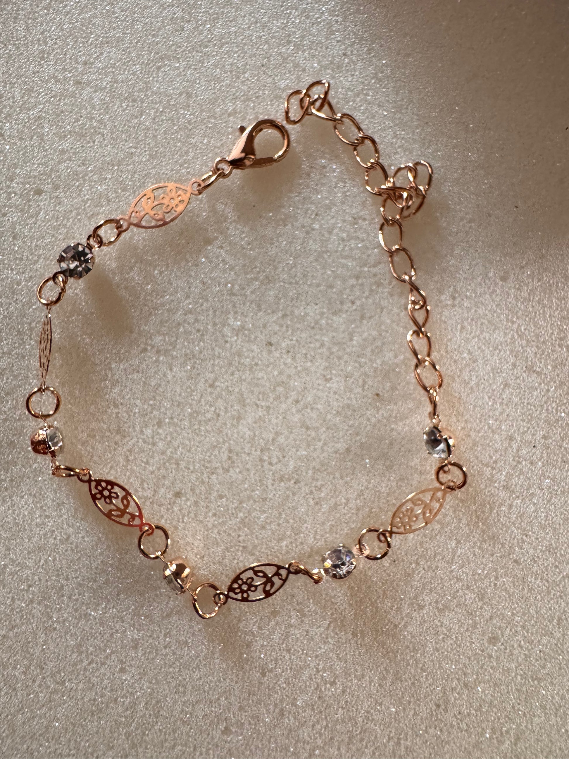 Flora Glint Bracelet Discover minimal, everyday gold jewelry designed for modern women. Shop earrings, rings, and necklaces at Erica Jewelry.