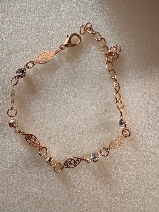 Flora Glint Bracelet Discover minimal, everyday gold jewelry designed for modern women. Shop earrings, rings, and necklaces at Erica Jewelry.