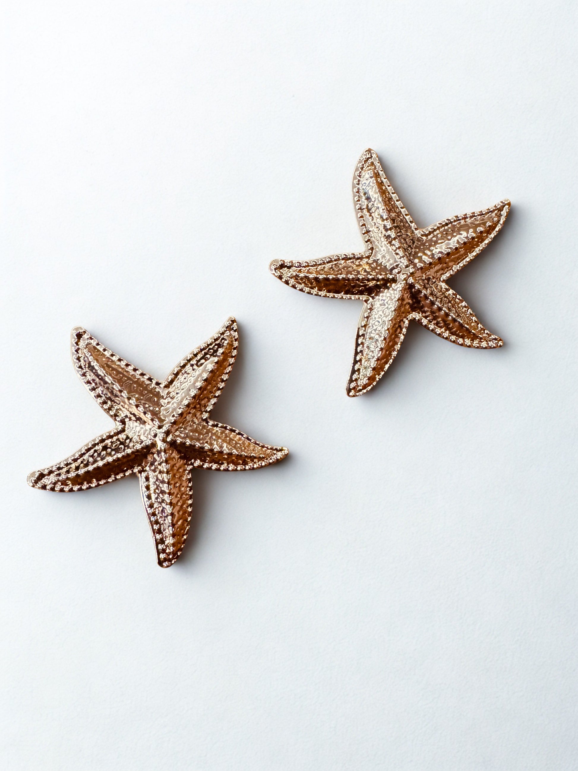 Golden Starfish Statement Set Elegant, dainty and minimal jewelry perfect for everyday wear. Handcrafted gold and silver jewelry from Erica Jewelry India collection.
