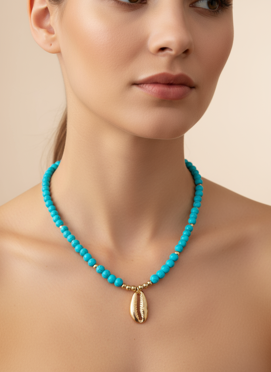 Turquoise Cowrie Charm Necklace
Elegant, dainty and minimal jewelry perfect for everyday wear. Handcrafted gold and silver jewelry from Erica Jewelry India collection.
