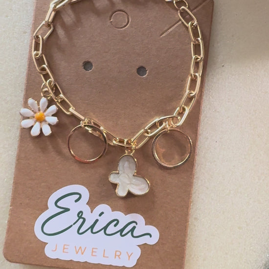 Butterfly Bloom Charm Bracelet Discover minimal, everyday gold jewelry designed for modern women. Shop earrings, rings, and necklaces at Erica Jewelry.